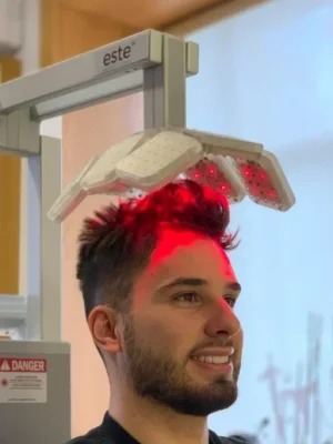 Man getting low-lever laser therapy (LLLT) for hair loss at hairloss-recovery FDA approved for androgenetic alopecia