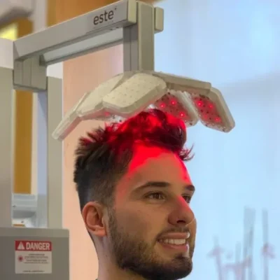 Man getting low-lever laser therapy (LLLT) for hair loss at hairloss-recovery FDA approved for androgenetic alopecia